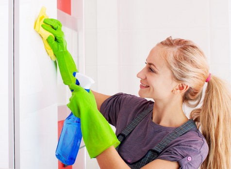 Professional office cleaning in a modern workspace reception area