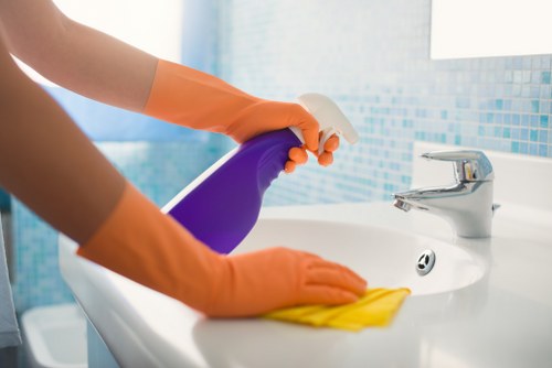 Detailed office cleaning tasks in a busy workplace